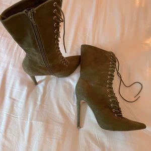Really cute laced up green boots.